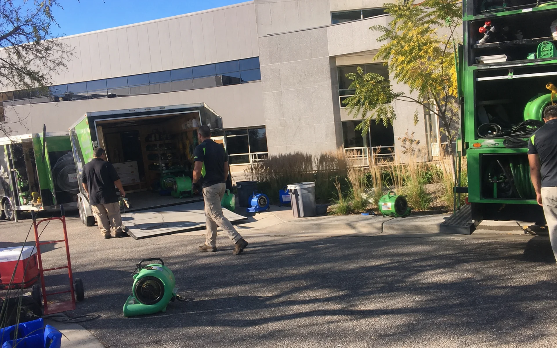 Commercial restoration crew mobilizing at a large facility