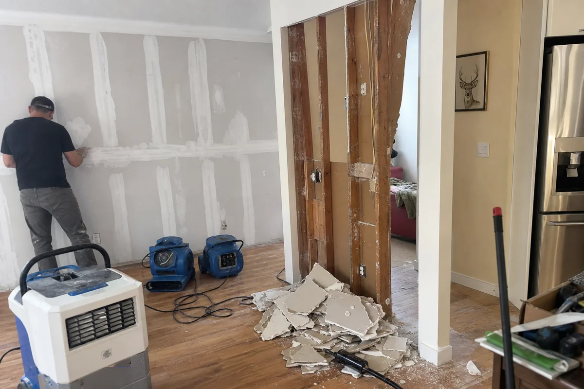 Split scene of drywall drying vs replacement